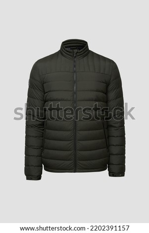 Ghost mannequin. Green Men's puffer down jacket without human isolated on white background. Winter clothes with high collar, pockets for male. 3d voluminous cloth. Template, mock up Royalty-Free Stock Photo #2202391157