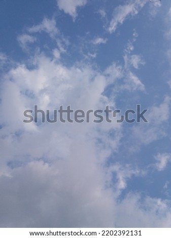 White clouds almost cover the blue sky or bright blue sky and are full of white clouds during the day