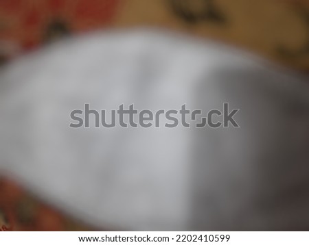 Defocused or blurred abstract background of white mask used to protect ourself from virus