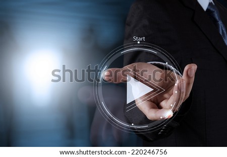 hand press play button sign to start or initiate projects as concept