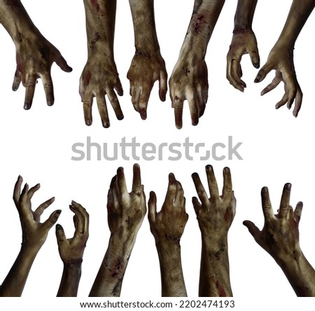 Many hands of scary zombies isolated on white  Royalty-Free Stock Photo #2202474193