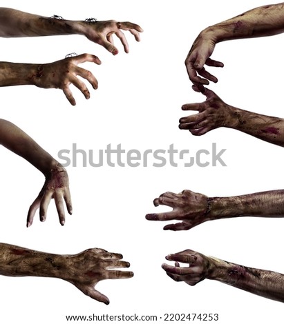 Many hands of scary zombies isolated on white  Royalty-Free Stock Photo #2202474253