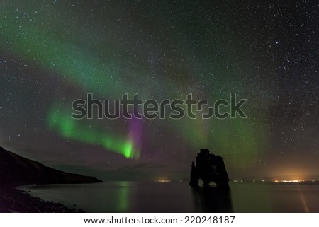 Beautiful aurora borealis, northern light at hvitserkur, Iceland 