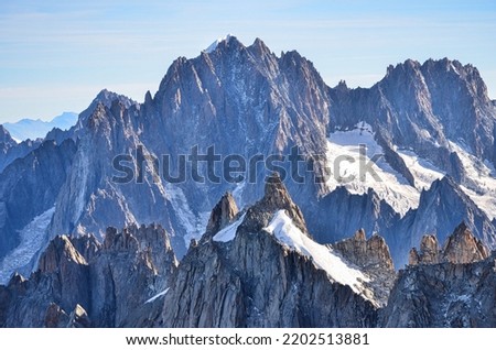  fantastic mountain peaks from the aiguille du tacul mont blanc massif photographed from the aiguille du midi above chamonix. High quality photo Royalty-Free Stock Photo #2202513881
