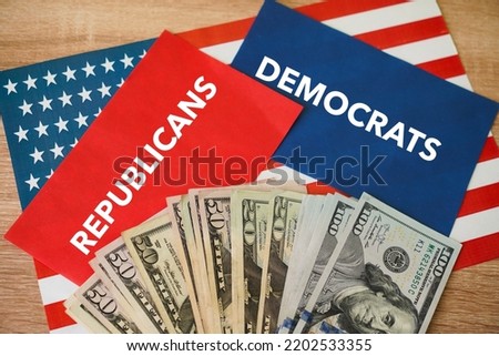 american flag and symbol of ballot, Democrats or Republicans? United States House of Representatives elections 2022 concept, closeup Royalty-Free Stock Photo #2202533355