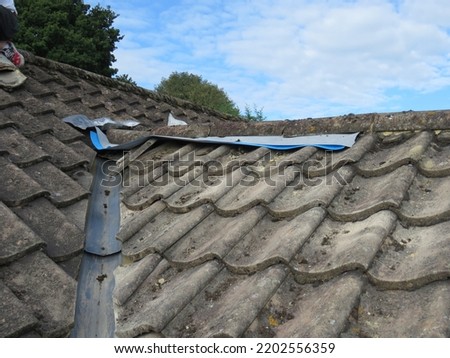 Tiled roof ridge line repairs