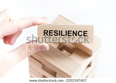 Resilience word concept on cubes on white background