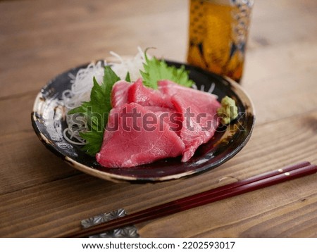 Tuna sashimi offcuts and beer