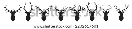 Head of deer silhouettes vector. Deer antlers vector set. Silhouette of the horns of a wild elk, roe deer on a white background. Hand drawn silhouettes of hunting trophies.