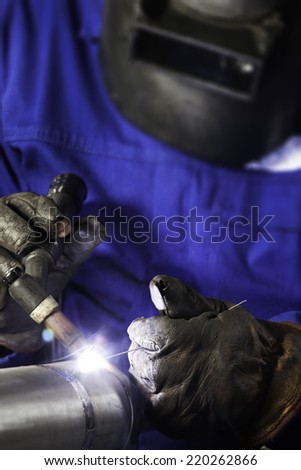 Welder busy with welding work