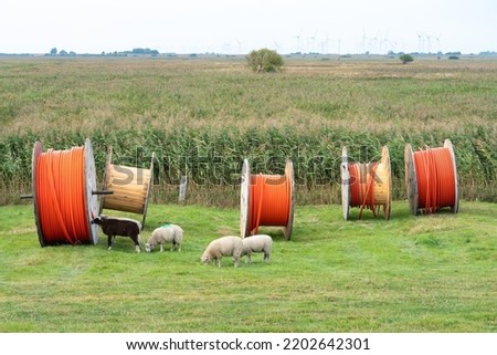 Broadband cable drums to develop rural areas  Royalty-Free Stock Photo #2202642301