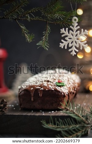 Chocolate cake covered on christmas background