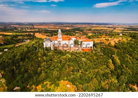 Aerial View of Pannonhalma Archabbey Hungary. Pannonhalma Abbey library interior in Hungary. UNESCO World Heritage Site. Discover the beauties of Hungary.


