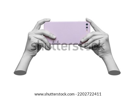 Mobile phone with photo camera in female hands isolated on a blue background. Mockup of a smartphone. A young woman takes picture. 3d trendy collage in magazine style. Contemporary art. Modern design
