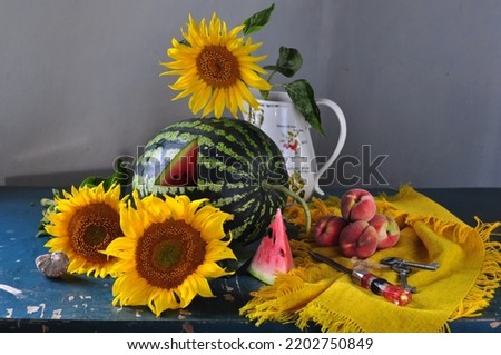 still life with watermelon, flowers and fruit
