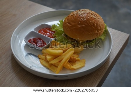 Delicious Hamburger with French Fries