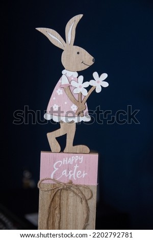 colored cardboard in the shape of a bunny, Easter decoration
