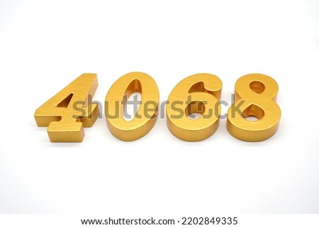  Number 4068 is made of gold-painted teak, 1 centimeter thick, placed on a white background to visualize it in 3D.                                