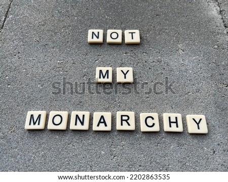Concept image of tiles spelling not my monarchy referring to the current anti monarchy movement