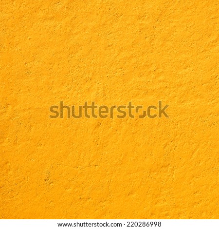 Mexican yellow rough wall for background Royalty-Free Stock Photo #220286998