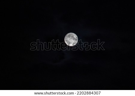Full Moon in the dark sky. Night Sky photography. Largest bright moon of the year.