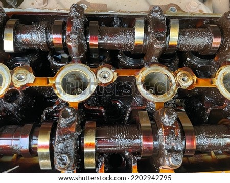 Car engine full of sludge due to using of wrong viscosity lubricant and delayed lubricant change Royalty-Free Stock Photo #2202942795
