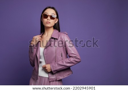 Fashion asian female model. Lilac leather jacket,  Asian fashion Royalty-Free Stock Photo #2202945901