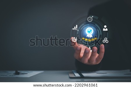 Quality Assurance Concept. Business people show high quality assurance mark, good service, premium, five stars, premium service assurance, excellence service, high quality, business excellence. Royalty-Free Stock Photo #2202961061