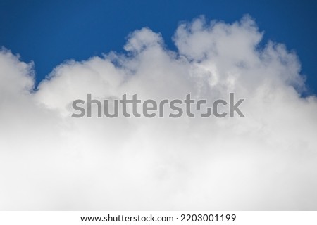 Sky background with big white clouds.