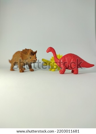 Small plastic animal figurine toy on a white background