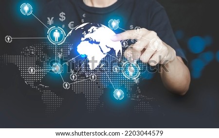 hand touching touching global and icon customer network connection on virtual screen. Management to describe the selection of leaders and staff. Enterprise Resource Planning ERP