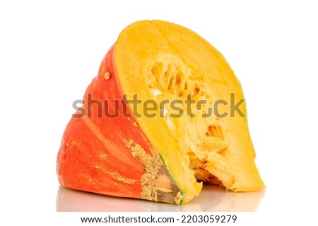 One part of ripe organic pumpkin, macro, isolated on white background.