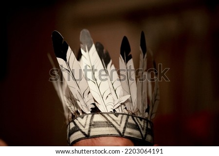indian headdress hand made from paper Royalty-Free Stock Photo #2203064191