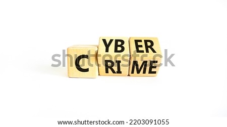 Cyber crime symbol. Concept words Cyber crime on wooden cubes. Beautiful white table white background. Business and cyber crime concept. Copy space.