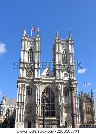 The Union Flag flying half-mast on the Westminster Abbey and Victoria Tower in London, UK