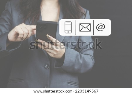 ustomer support hotline Contact concept Customer service representative's hands are filling out information from mobile phone to computer. and notify the contact address to the service use Royalty-Free Stock Photo #2203149567