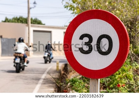 traffic sign limiting speed to 30 kilometers per hour, Randa, Majorca, Balearic Islands, Spain