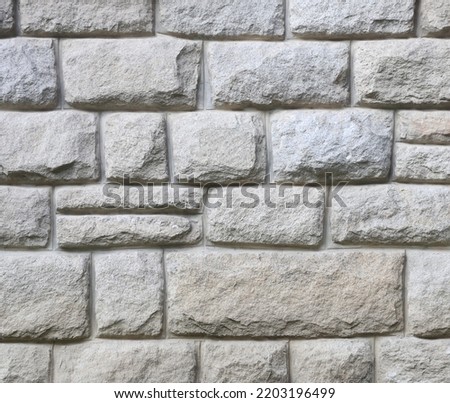 Granite tiles natural stone wall background Royalty-Free Stock Photo #2203196499