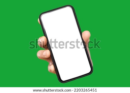 A black smartphone facing camera isolated on a green background