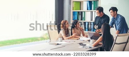 Banner Group of business people meeting in conference room. Panorama Asian businesspeople brainstorm teamwork partnership. Happy teams meeting graph chart business data meeting room with copy space Royalty-Free Stock Photo #2203328399
