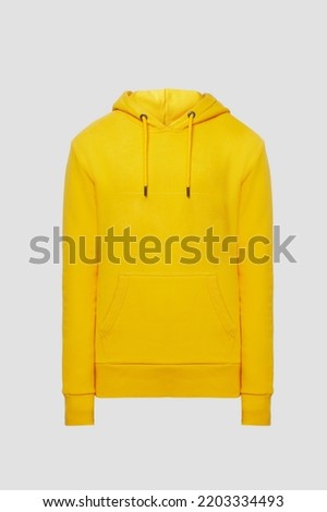 Ghost mannequin. Yellow men's Hoodie hoody without human model isolated on white background. Hooded Sweatshirt, Long sleeve with pocket for male. 3d voluminous cloth. Template, mock up Royalty-Free Stock Photo #2203334493