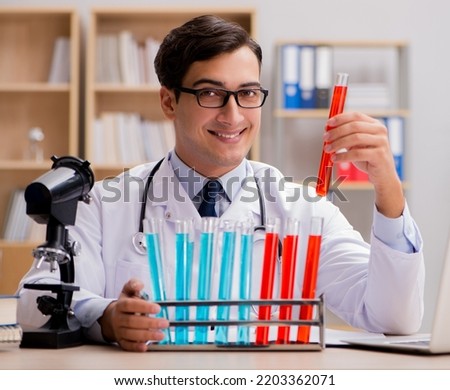Man doctor working in the lab