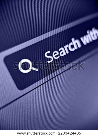 A pixelated closeup view of an internet browser UI with search text and secure lock icon