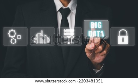 Big data concept, Person hand touching big data icon on vr screen on dark background