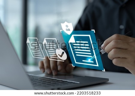 Smart Contract. Data Protection and Privacy Policy Concept: A Man Signing a Digital Signature on an Online Business Contract Royalty-Free Stock Photo #2203518233