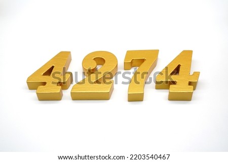  Number 4274 is made of gold-painted teak, 1 centimeter thick, placed on a white background to visualize it in 3D.                               