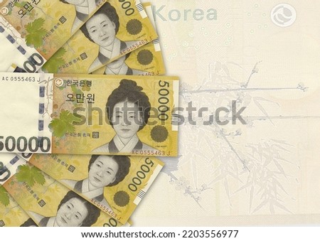 Background of 50000 Won banknote,Group of money stack of 50000 Won Korea banknote a lot of the background texture, top view Royalty-Free Stock Photo #2203556977