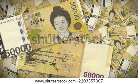 Background of 50000 Won banknote,Group of money stack of 50000 Won Korea banknote a lot of the background texture, top view Royalty-Free Stock Photo #2203557007