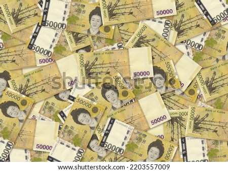Background of 50000 Won banknote,Group of money stack of 50000 Won Korea banknote a lot of the background texture, top view Royalty-Free Stock Photo #2203557009