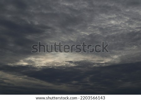 Dramatic sky background, stormy clouds in the dark sky, meteorology. Dark clouds on the sky before rain